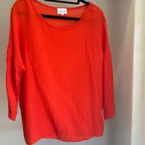 Pull over 100% cotton red Felicite top. Sleeve fall just above the wrist